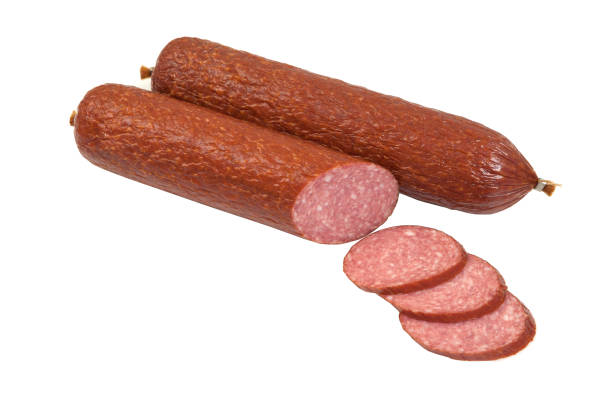 istock Smoked sausage cut into slices. 880557406