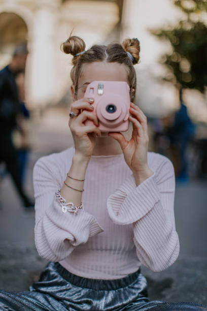 istock In love with pink colour and this instant camera 880561722