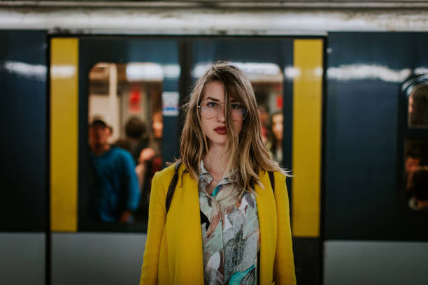 istock Young woman in Milan subway station 880565464