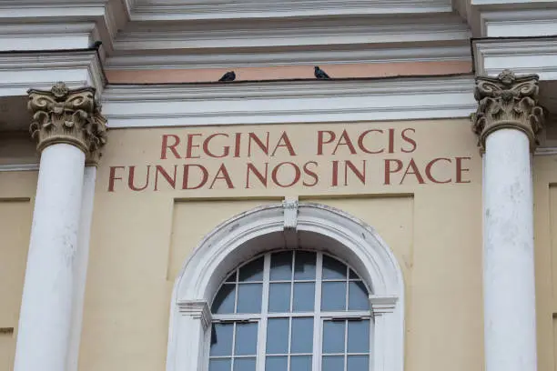 Church of St. Peter and St. Paul, Vilnius, Lithuania. Detail of facade. Latin inscription reads REGINA PACIS FUNDA NOS IN PACE (Queen of Peace, protect us in peace).