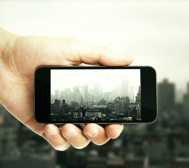 istock City picture with smartphone 880577844