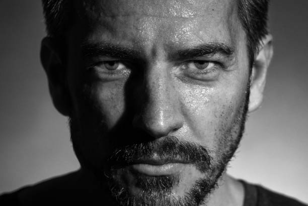 istock Front Portrait of a wet man face 880578016