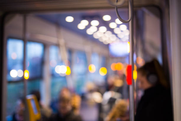 tram interieur, mensen, verlichting - kaartjesknipper stockfoto's en -beelden