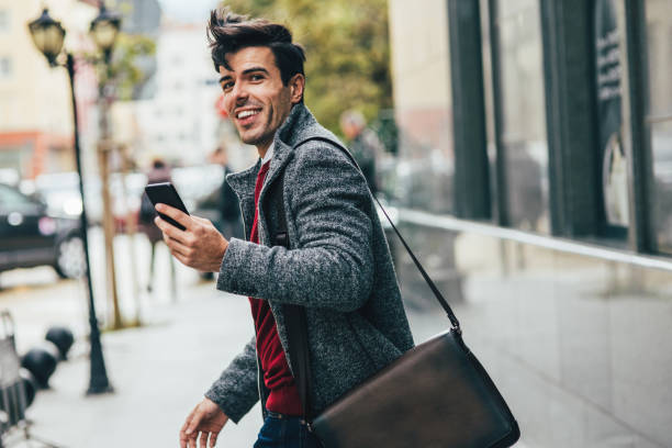 istock Man texting in the city 880594046