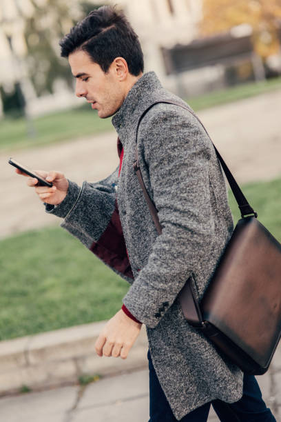istock Man texting in the city 880594062