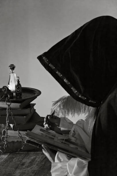 istock Female Wizard at table with Magical Items 880598974