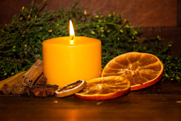 istock christmas ornaments with candles apples pines and pineapples 880612890