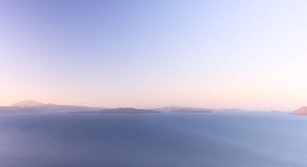 Sunrise in the early morning. Golden hour at Santorini Island. stock photo
