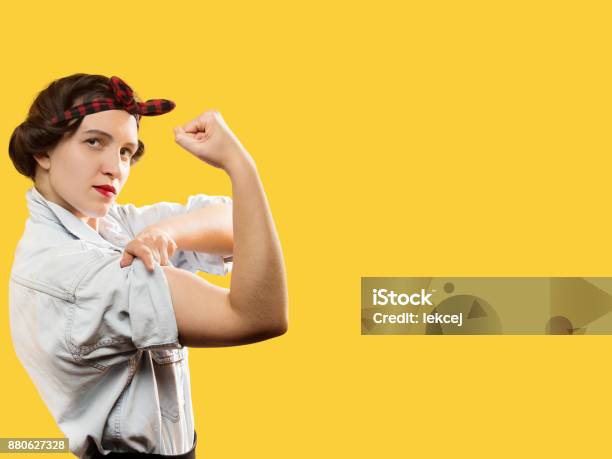 Woman Show Bicep Stock Photo - Download Image Now - Sleeve, Rolling, Women