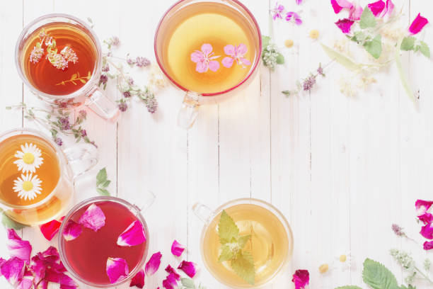 istock herbal  tea on white wooden background 880635896