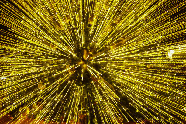 istock light lines with long exposure,  speed motion abstract background in the dark night ,  blast zoom effect , zoom burst light of christmas tree 880638244