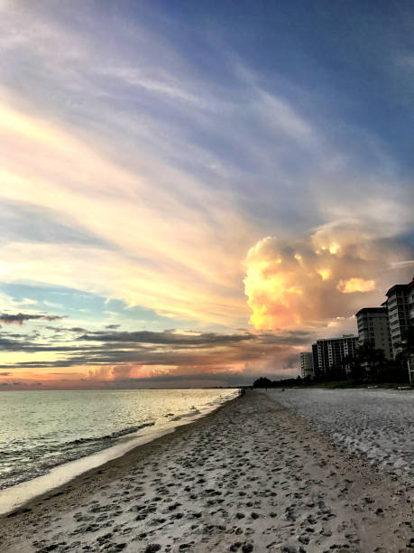 istock Colorful sky with cloudscape at Beach sunset 880705826