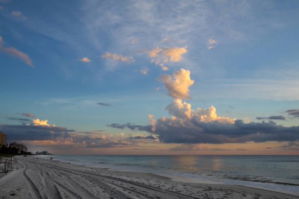 istock Colorful sky with cloudscape at Beach sunset 880705866