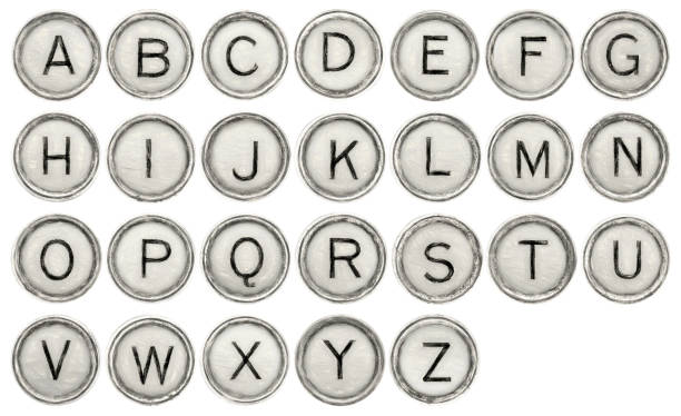 alfabeto en las teclas de la máquina de escribir - typewriter key fotografías e imágenes de stock