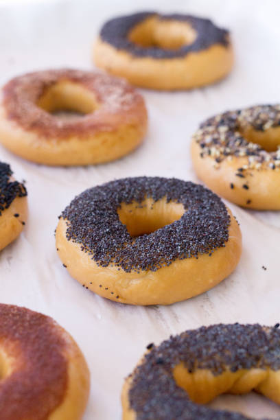 istock Unbaked Poppy Seed Bagel 880731112