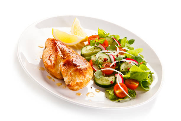 istock Fried chicken breast and vegetables 880752738