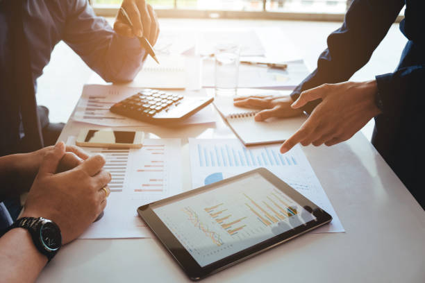istock Business team meeting working on digital tablet new business project 880752822