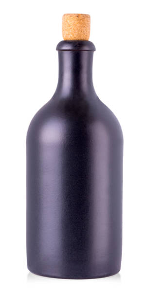 istock dark bottle with alcoholic beverage closed with a cork isolated on white background. 880753114