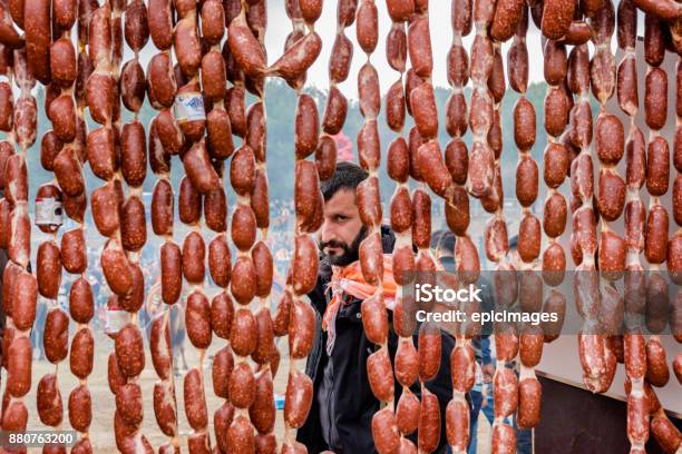 Man Selling Salami Made Of Camel Meat Stock Photo - Download Image Now - Activity, Animal, Asia - iStock Man Selling Salami Made Of Camel Meat Stock Photo - Download Image Now - Activity, Animal, Asia - iStock