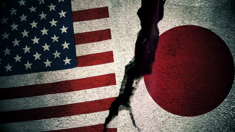 United States vs Japan Flags on Cracked Wall