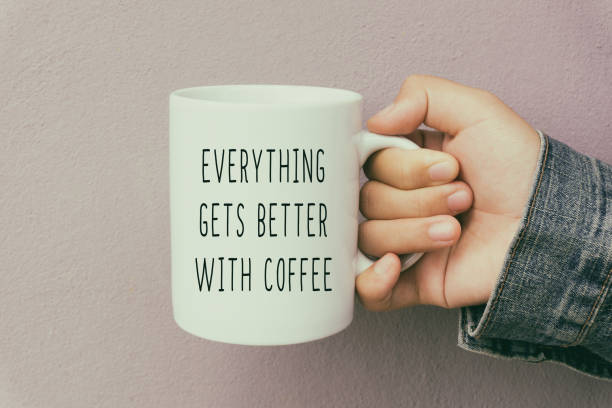 istock Hands Holding a Coffee Mug With Inspirational Quote 880766140