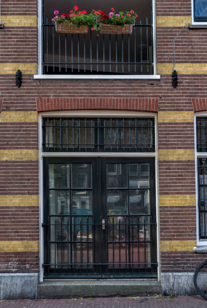istock The door and Amsterdam in typical Dutch style 880774048