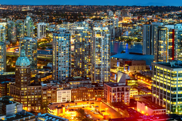 istock Shoot from above the beautiful night in megapolis 880786616