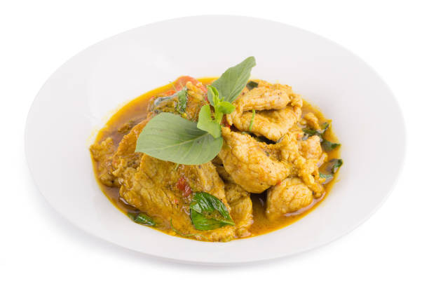 istock Fried pork with Chilli Curry, Thai spicy Food isolated on white background 880786654