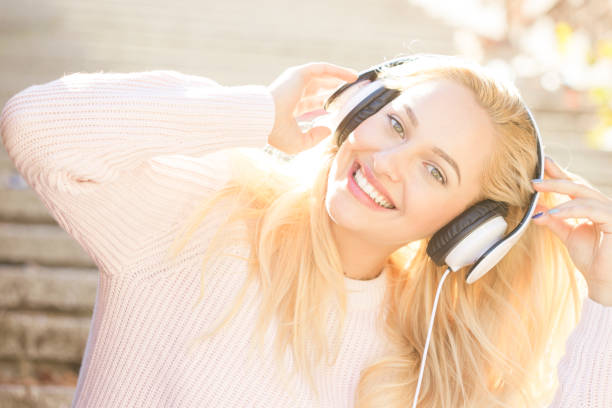 istock Girl enjoying the music 880789514