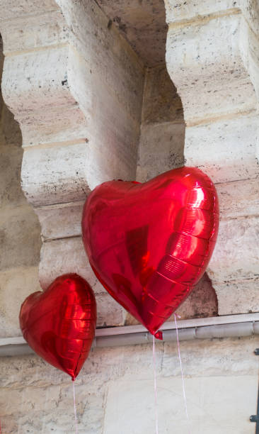 istock Heart shaped gold color metal object 880795588