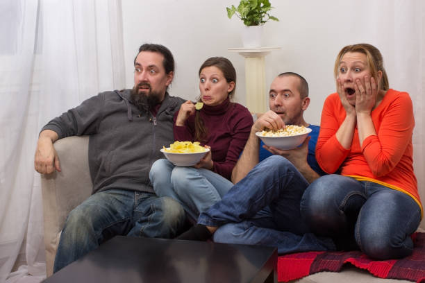 istock Couples watching a horror movie 880810854