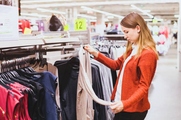 istock shopping, woman choosing clothes apparel 880816028