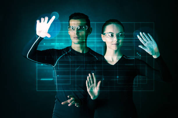 istock Couple working with futuristic display 880820772