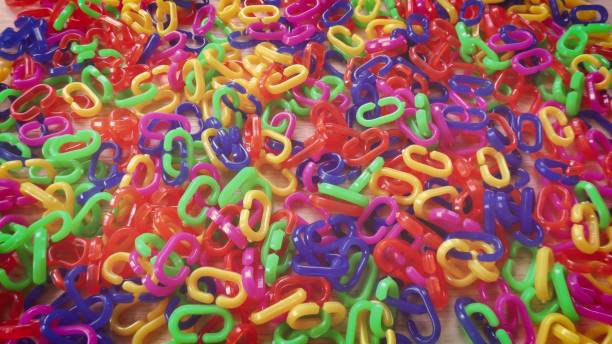 istock Pile of Colorful Plastic Chains Background 880828992