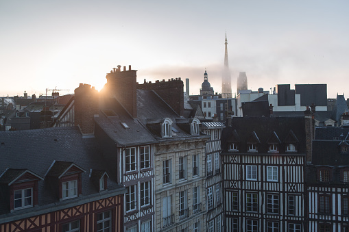 Panoramic view on the roofs in Rouen in a beautiful sunset, France