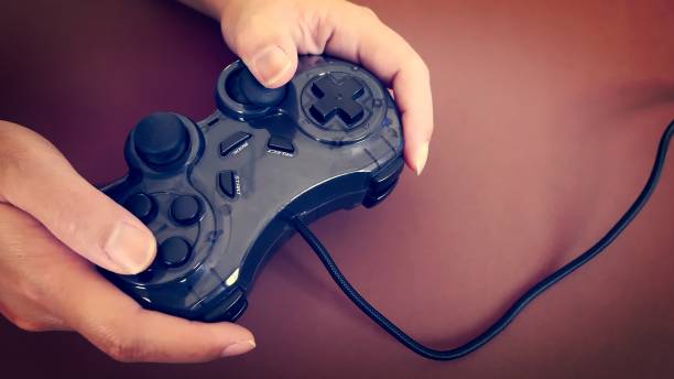 istock Playing Games with Black Joy Stick in Hand 880834134