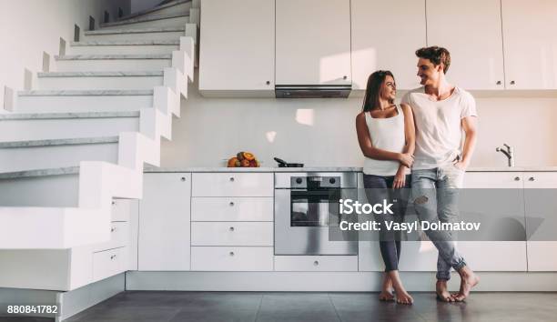 Couple At Home Stock Photo - Download Image Now - Couple - Relationship, Kitchen, Modern