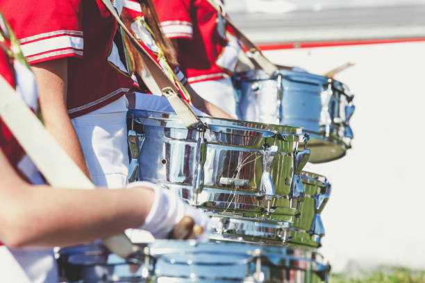 istock Group drummer girls in uniform on summer holiday 880851478