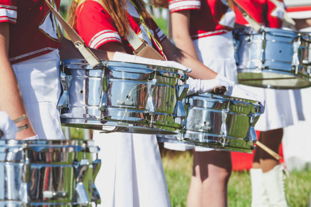 istock Group drummer girls in uniform on summer holiday 880851506