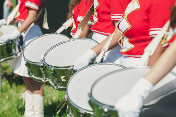 istock Group drummer girls in uniform on summer holiday 880851538