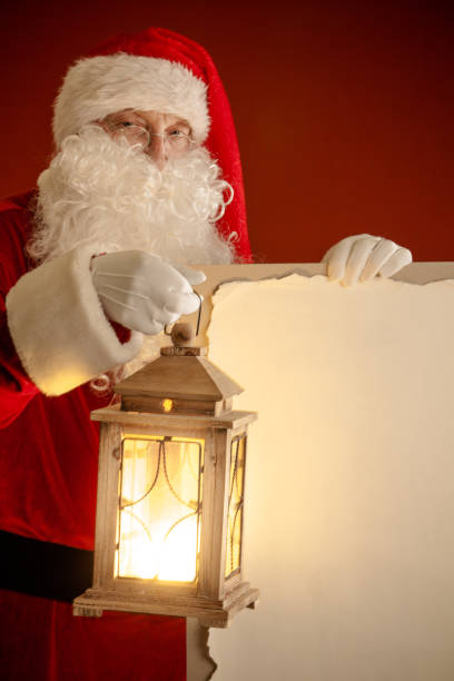 istock Santa Claus with lantern 880860226