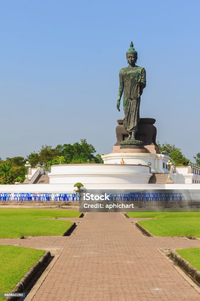 buddha statue stand up buddha statue stand up at outdoor in big park Ancient Stock Photo