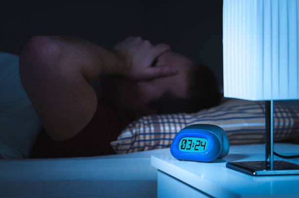 istock Insomnia and sleepless concept. Man unable to sleep. Exhausted and tired. 880860992