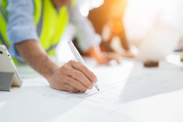 istock Close up of engineer hand drawing 880883370