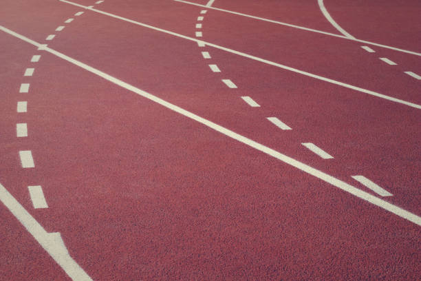 istock Running track on stadium. Red running track. Sport Background. 880908786