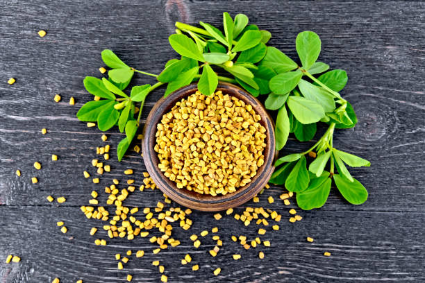 istock Fenugreek with leaf in bowl on board top 880908990