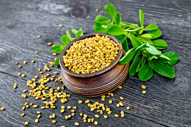 istock Fenugreek with leaf in bowl on board 880908996