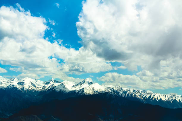 Free Stock Photo of Snow Covered Mountain Under Cloudy Blue Sky ...