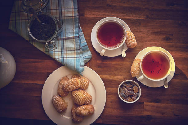 Cup of Black Tea Served with Biscuits