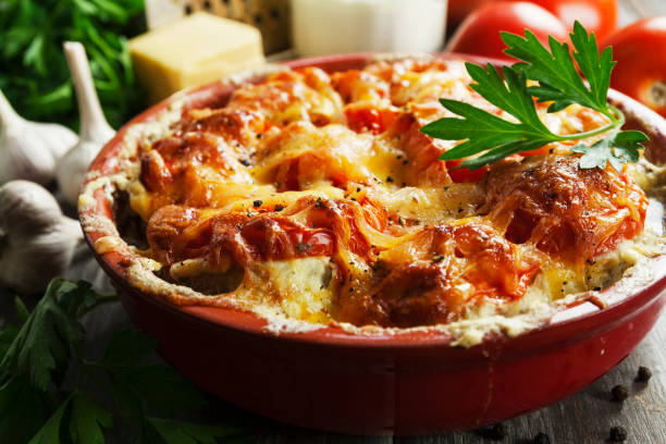 istock Fish baked with tomatoes, sour cream and cheese 880933992